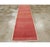 A vintage Turkish Anatolian rug from the second half of the 20th century with a diamond pattern set on a brick ground....