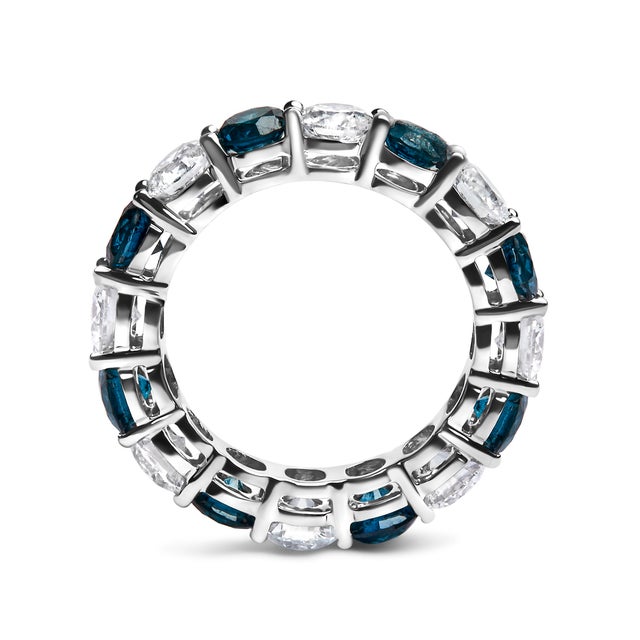 Discover the breathtaking elegance of our alternating diamond eternity band, a harmonious blend of innovation and...