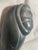 This stone carving represents the rich artistic tradition of Inuit sculpture that has been practiced for thousands of...