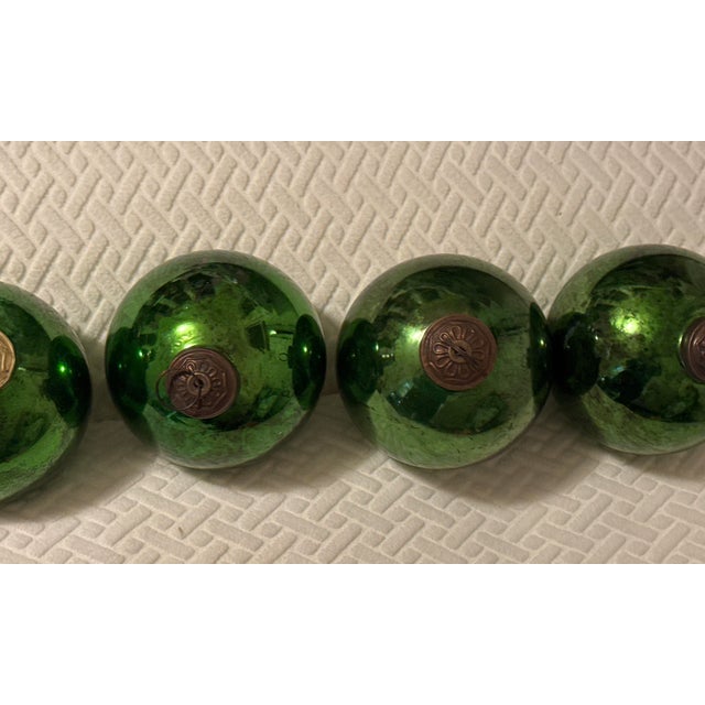 Four (4) Green Kugel Ornaments (Authentic Mercury Glass, Late 19th–Early 20th Century) Heavy weight • Brass caps with...