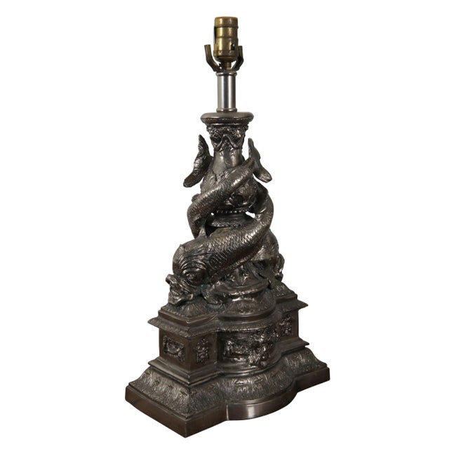 Rare vintage Maitland Smith table lamps, made of heavy cast metal with a bright silver finish, showing a Neoclassical...