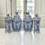 Refined 19th century Belgian Boch faience garniture offers the timeless beauty of hand-painted blue and white Delft...