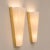 A pair of 1970s Italian wall lamps crafted from acrylic glass, metal, and brass, in the Stilux style. The design features...