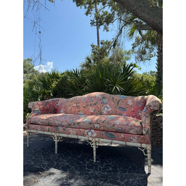 A beautifully crafted vintage camelback sofa from the Mark Hampton Collection for Hickory Chair, showcasing timeless...