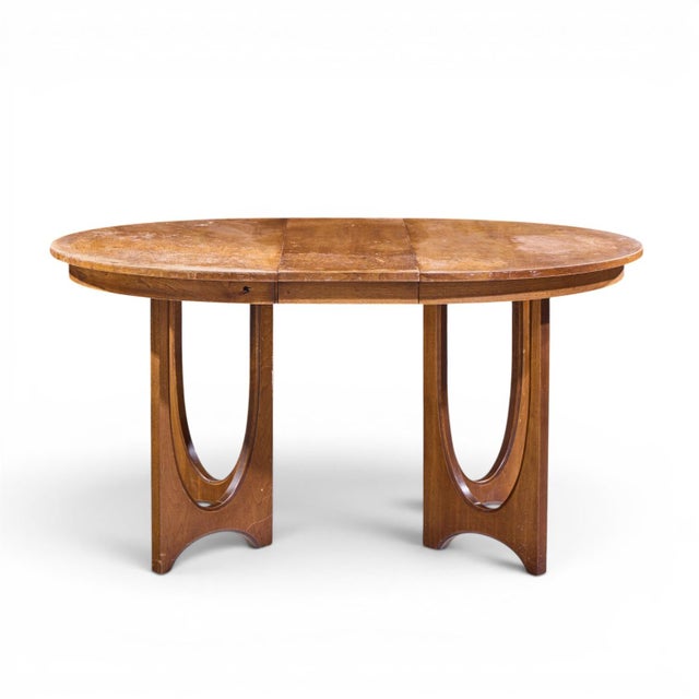Broyhill Brasilia Mid Century Dining Table with 1 Leaf This table measures: 44.25 wide x 44 deep x 29.75 inches high, with...