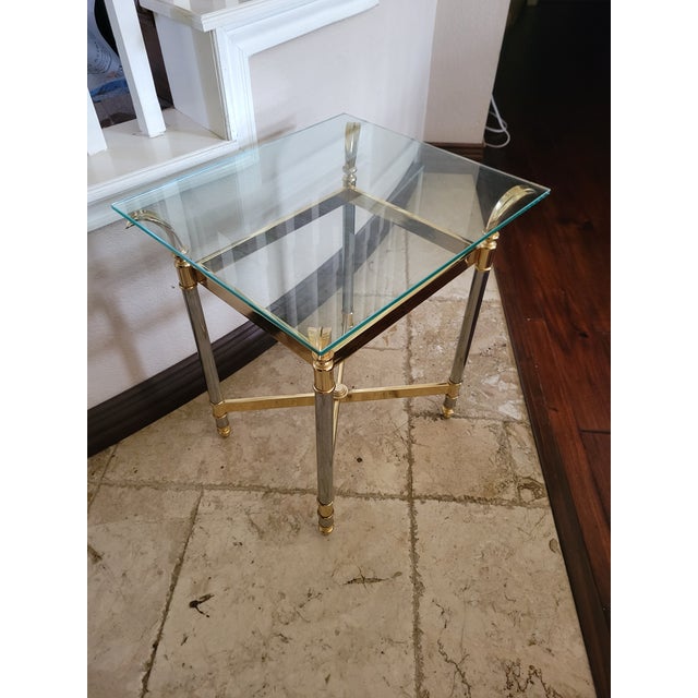 Gorgeous vintage mixed‑polished brass and chrome glass‑top accent table, with Hollywood Regency and Modernist influence.