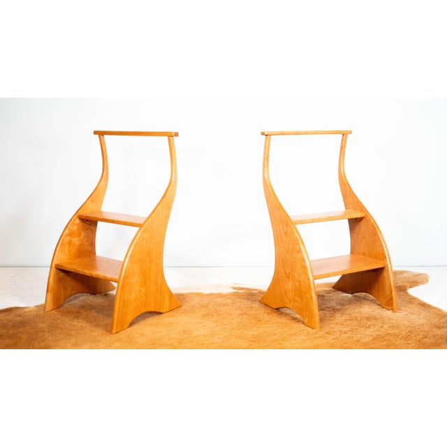 American Studio Cherry Wood step stool with handle, circa 2000s. Artisan-crafted with Art Nouveau influence. Elegant...