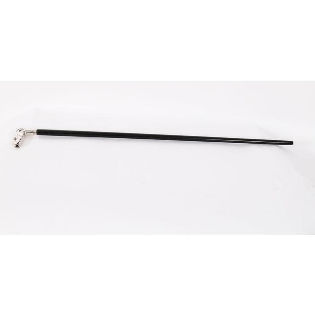 This is a beautiful antique French sterling silver walking stick, circa 1890 in date. The striking stick features a sleek...