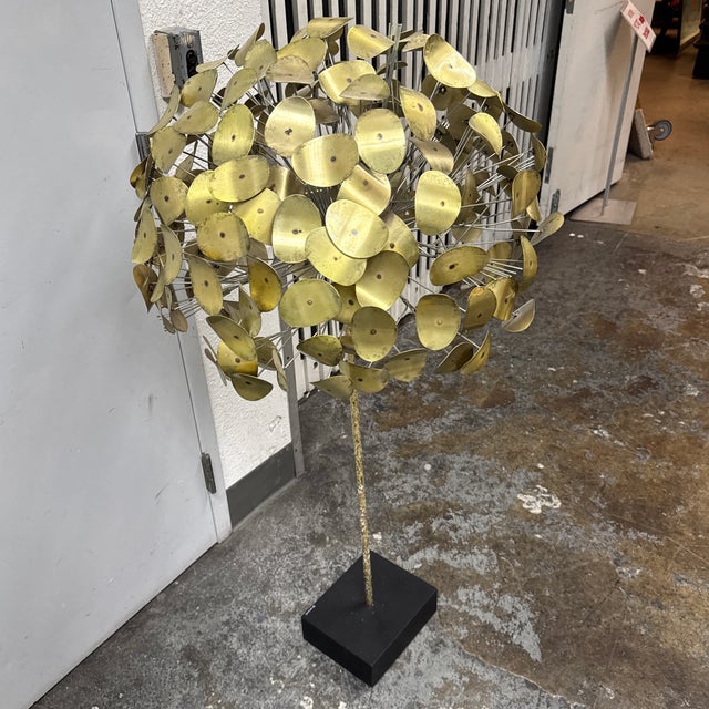 Design Plus Gallery presents a Curtis Jeré “Raindrops” Tree Sculpture. An iconic mid-century metalwork design associated...