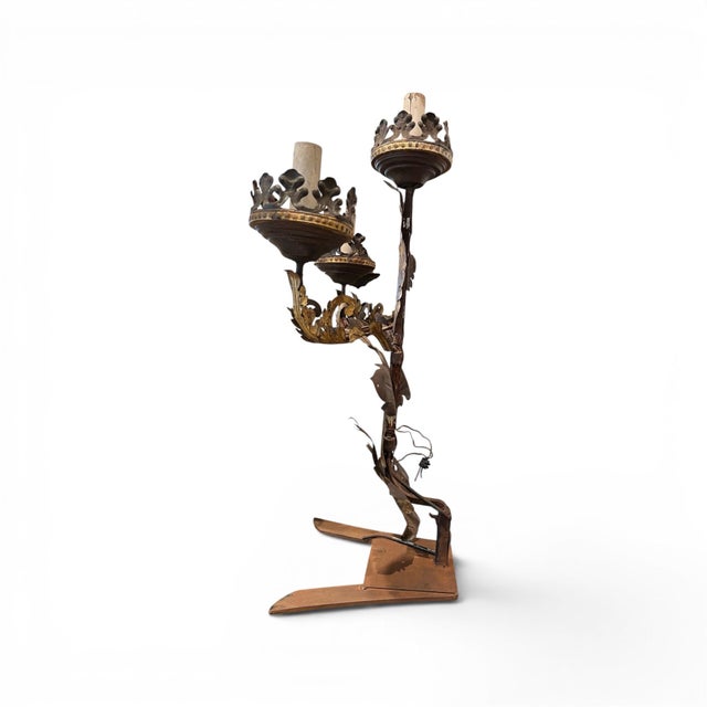 This elegant pair of 19th century Italian candelabras features three gracefully scrolling arms and a beautifully aged...