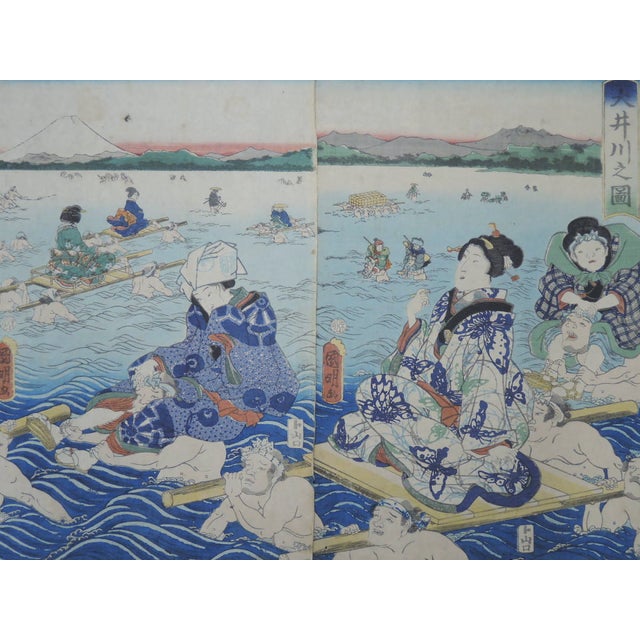 This magnificent triptych captures one of the most iconic scenes of the old Tokaido Road: the crossing of the formidable...
