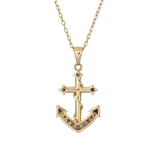 Finely detailed diamond Anchor pendant & necklace crafted in 14 karat yellow gold (circa 1970s). Diamonds total an...