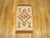 A vintage decorative rug from the Zapotec Indian tribe in Oaxaca, Mexico, size 3'3 x 1'8, featuring a central medallion on...