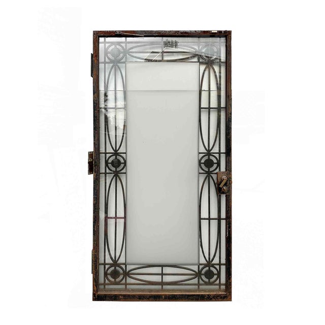 Antique wrought iron entry door in the Georgian style. Three large bronze hinges in good working order. Structurally in...