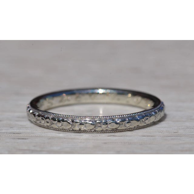 The Camargo: Antique Ladies Signed 18K Eternity Wedding Band. Crafted in 18 karat white gold, this ladies eternity band...