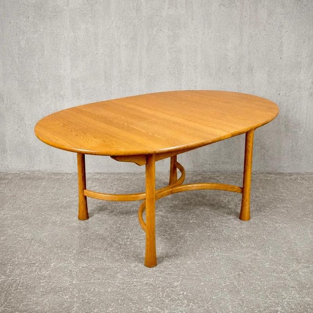 Saville Oval Dining Table in Blonde Elm from Ercol For Sale - Image 9 of 9