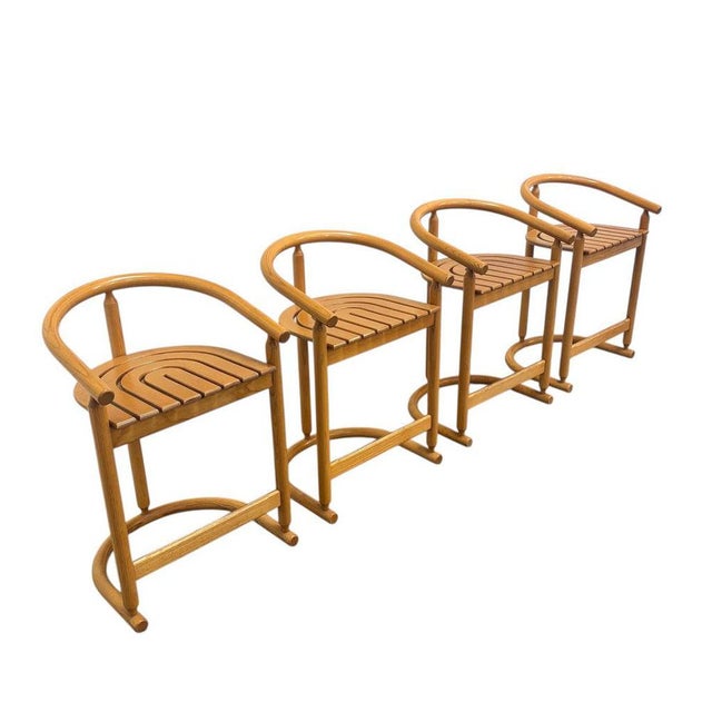 Remarks: Set of four vintage bar stools by Allmilmö, Germany 1980s. Oak frames and plywood seats. All in good condition...