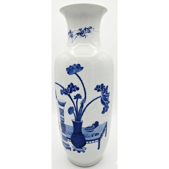 Qing Dynasty (Kangxi Reign) Blue and White Porcelain Rouleau Vase "Wan lu zhong shi" has measurements of approximately...