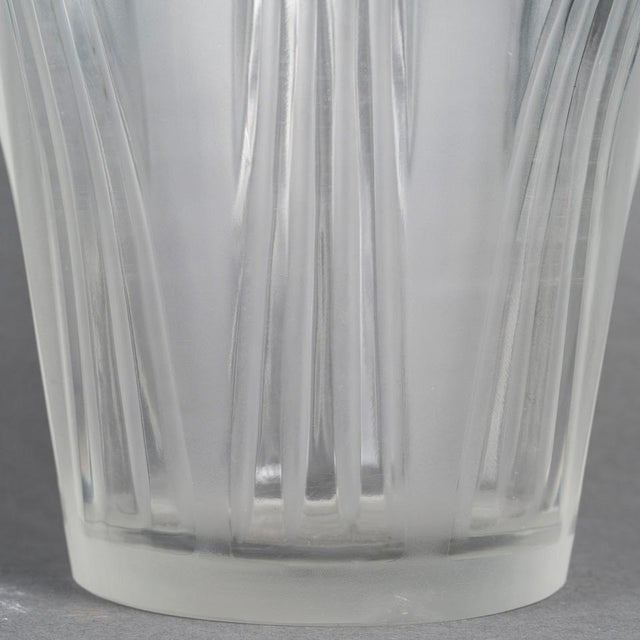 Pressed molded crystal vase Model created by Marc Lalique in 1950. Signature with stylus. Height 28 cm Lalique design No....