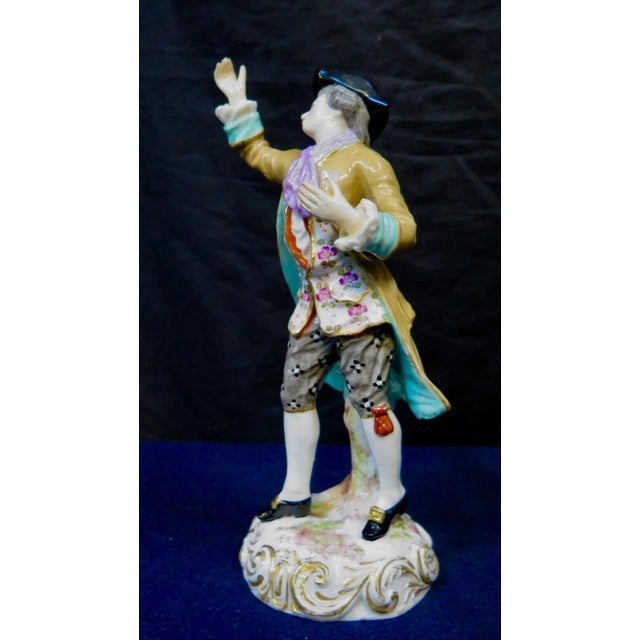 This 19th century Meissen porcelain cabinet figure of a nobleman is beautifully rendered & dressed in a detailed colorful...