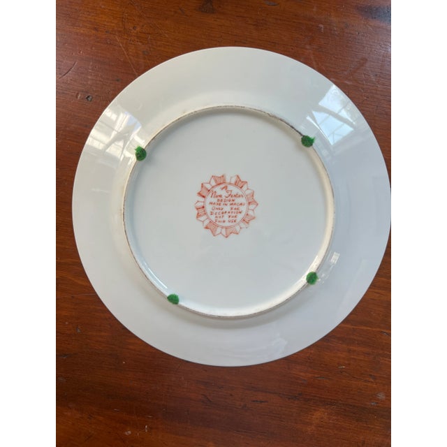 Timeless and classic, this pair of vintage hand painted chinoiserie plates add instant color and texture to any space....