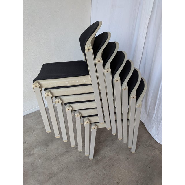 Set of 8 vintage stackable chairs by Aeon Mondial, produced in the Netherlands around the 1980s. This model represents an...