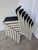 Set of 8 vintage stackable chairs by Aeon Mondial, produced in the Netherlands around the 1980s. This model represents an...