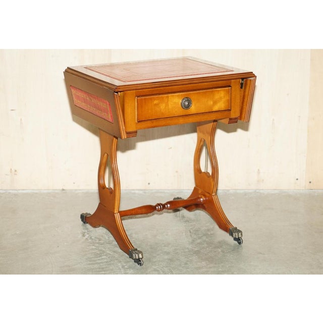 Royal House Antiques is delighted to offer for sale this lovely decorative English single drawer side table with extending...
