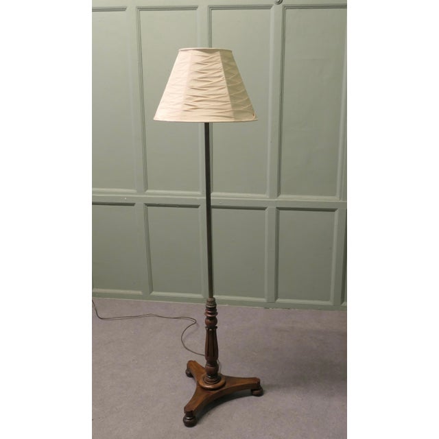 Edwardian Brass and Mahogany Floor Standing Reading Lamp This charming floor Standing reading lamp is just the perfect...