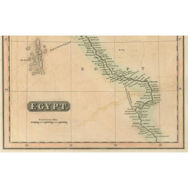 This refined early 19th-century map composition presents two related geographic views of Northeast Africa: Egypt with the...