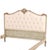 Featuring a shaped and tufted upholstered headboard with button detailing, this bed frame is accented with scrolling...
