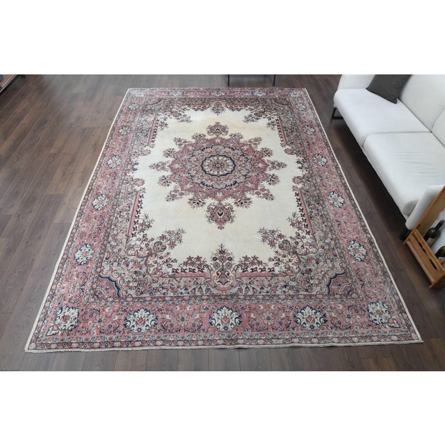Vintage Hand-Knotted area rug is a semi-antique vintage area rug. The '70s Eastern region of Anatolian's unique rug is...