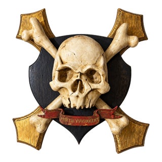Hand Sculpted, Carved and Parcel Gilt Skull and Crossbones Memento Mori Mounted on a Decorative Plaque For Sale