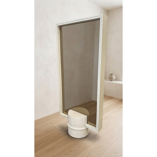 This striking mid-century modern double-sided hall stand combines elegant design with everyday practicality. One side...
