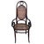 Victorian high-back Thonet number 17 armchair features an elegant, sculptural frame crafted from warm-toned bentwood with...
