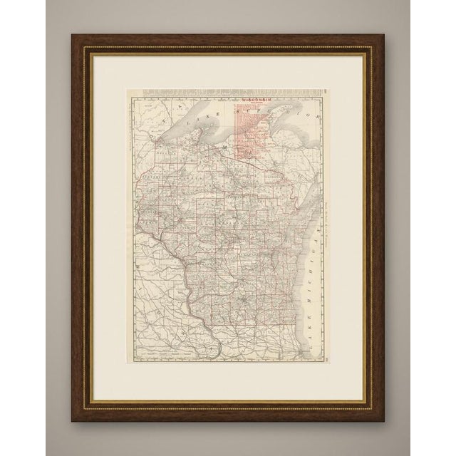 An original antique map of Wisconsin from the 1899 Rand McNally indexed atlas, this double-page sheet lays out the full...