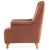 An elegant Italian upholstered lounge chair, circa 1940, retaining its original character and featuring a striking red and...