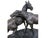 This sculpture is a refined group in dark patinated bronze, the work of French artist Pierre-Jules Mène (signed "P.J....