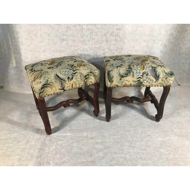 This elegant pair of French Baroque-style tabouret (stools) showcases the graceful curves and refined craftsmanship...