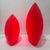 Monica Lipken designed decorative table lamps manufactured by Elmar Flototto. Elliptical shaped lamps of textured red...
