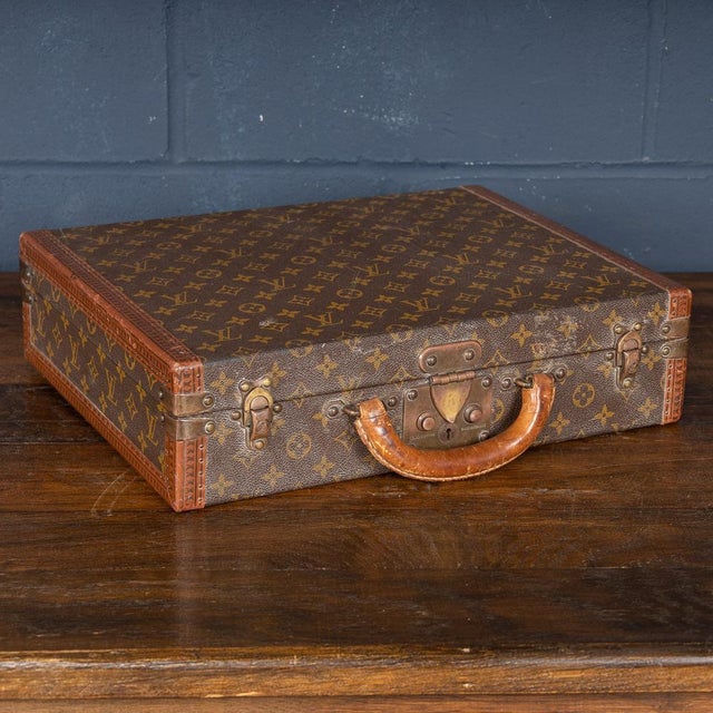 A charming Louis Vuitton hard-sided case, late 20th century, the exterior finished in the famous monogram canvas with...