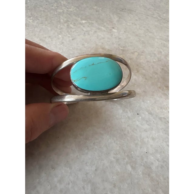 Lovely vintage sterling silver and turquoise cuff made in Mexico. Beautiful oval turquoise stone set in sterling silver....
