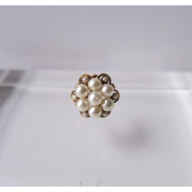 This is part of Chairish’s Fine Jewelry assortment. A beautiful white cultured pearl and 14-karat yellow gold cluster...