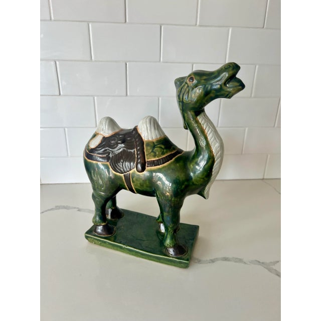 This midcentury camel statue is the perfect size for your built-in or mantle. The gorgeous green mixed with brown and...