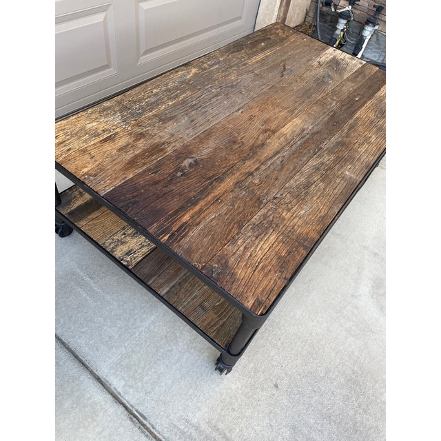 Gorgeous coffee table! Built of textured iron and reclaimed wood with gorgeous texture and history