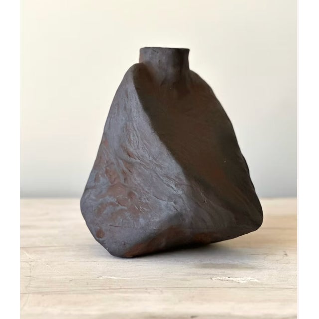 Trent Kendrick VESSEL - TORSO stoneware with glaze Stone-like in form, vessel by intention. The raw clay exposed at the...