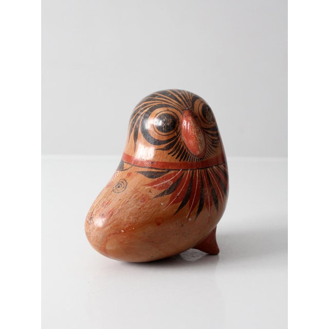 A mid-20th century Mexican folk art pottery bird, hand-painted and signed Rivera, in the Tonalá tradition. The sculpted...