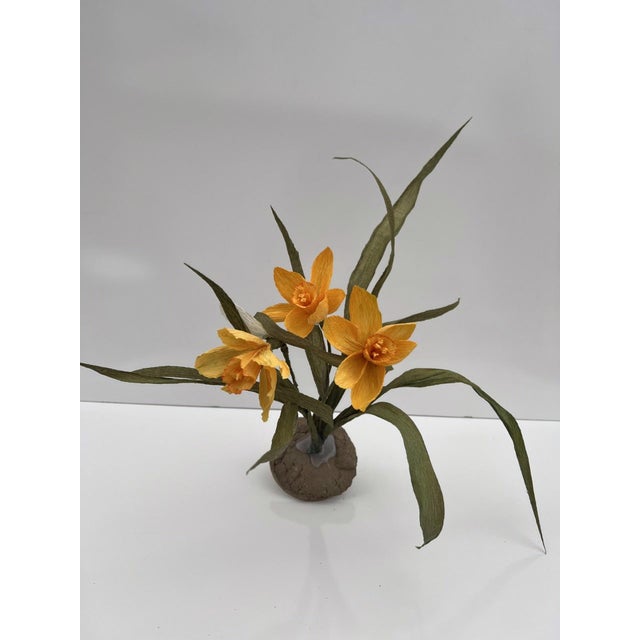 Foreshadow III by Ashley Folkner | Cement and wood sculpture of yellow flowers with leaves For Sale