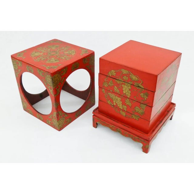 Antique Chinese gilt red lacquered lunchbox. Depicting gold blossoming flowers and melons. Late Qing Dynasty (1644-1912)....