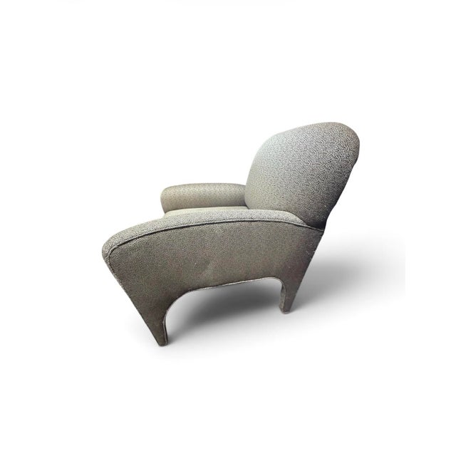 A striking set of four sculptural lounge chairs attributed to Vladimir Kagan, exhibiting the soft organic curves and...